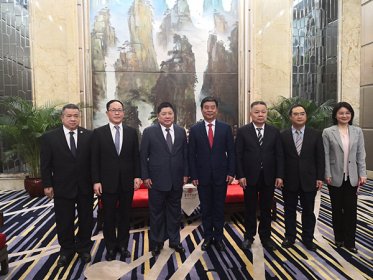 何报翔会见全国台企联会长王屏生一行